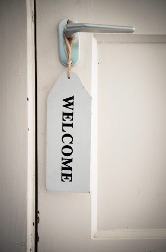 stockvault-welcome-sign-on-door131469 (1)